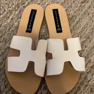 Steve Madden white slip on sandals